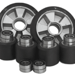Rubber wheels on aluminum core, various sizes, precision ball bearings, industrial heavy-duty use.